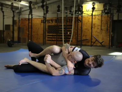 A member taking back control of a training partner on the mat.
